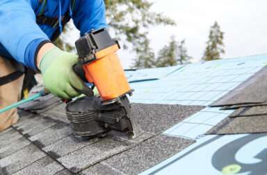 a roofer working on a roof