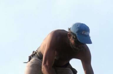 a man working on a roof
