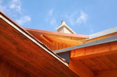 brown wooden house under blue sky during daytime