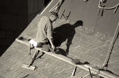 man on a roof