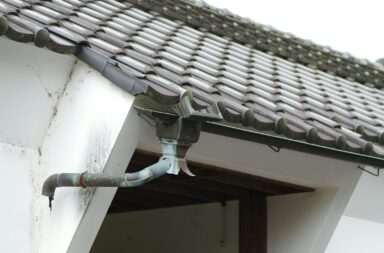 A close up of a roof with a pipe sticking out of it