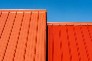 brown wooden wall under blue sky during daytime